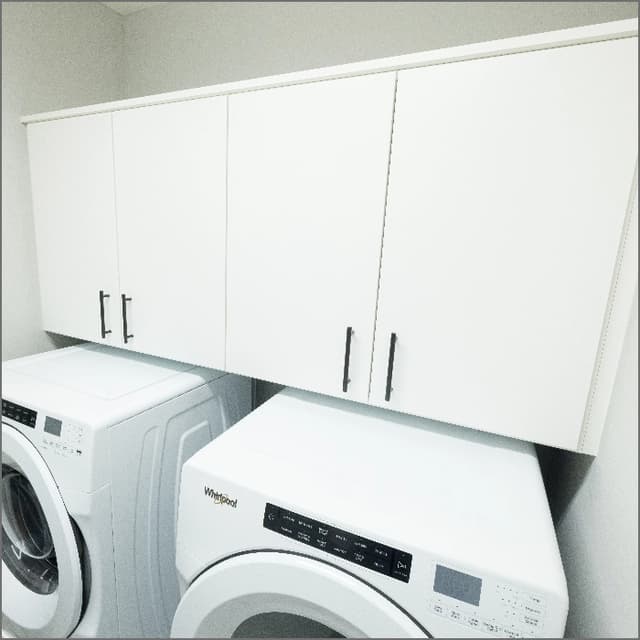 Microwave storage with white cabinets