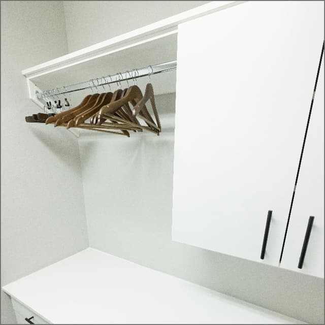 pull out pantry with white cabinets