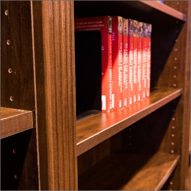 brown cabinets with roll out pantry