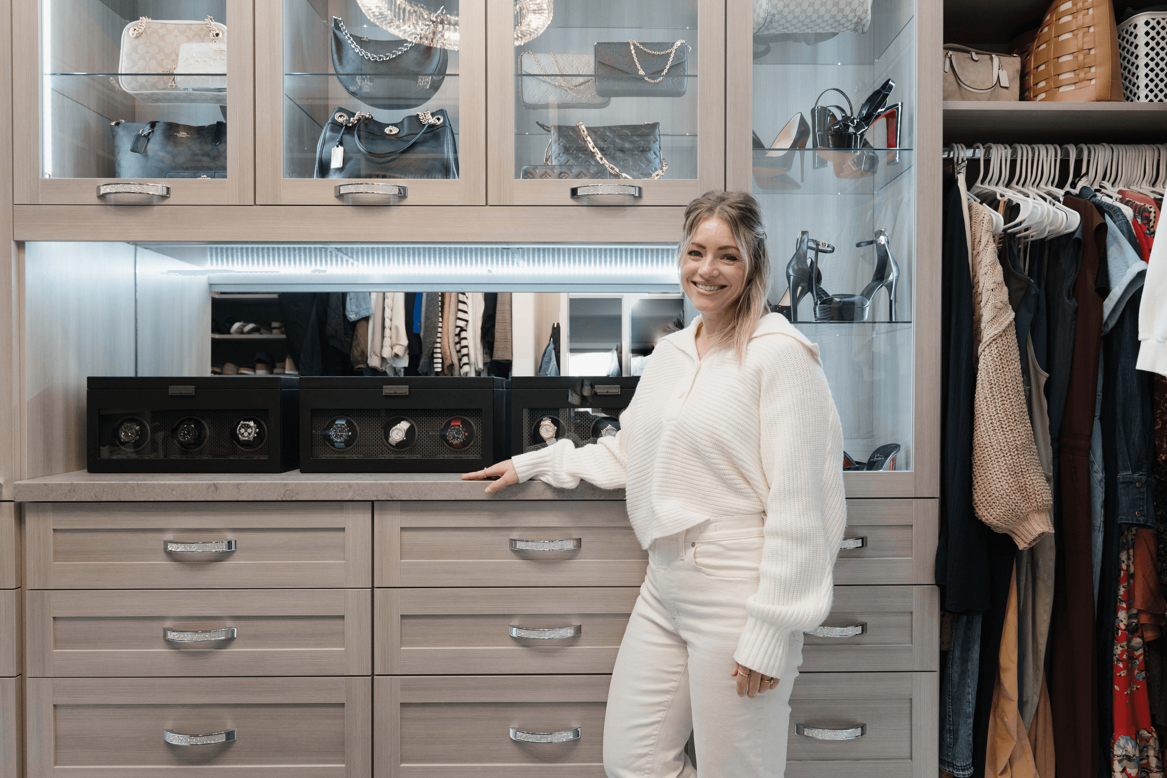 designer standing next to custom cabinetry
